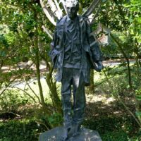 "Standing Man with Radiating Words" von Lesley Dill